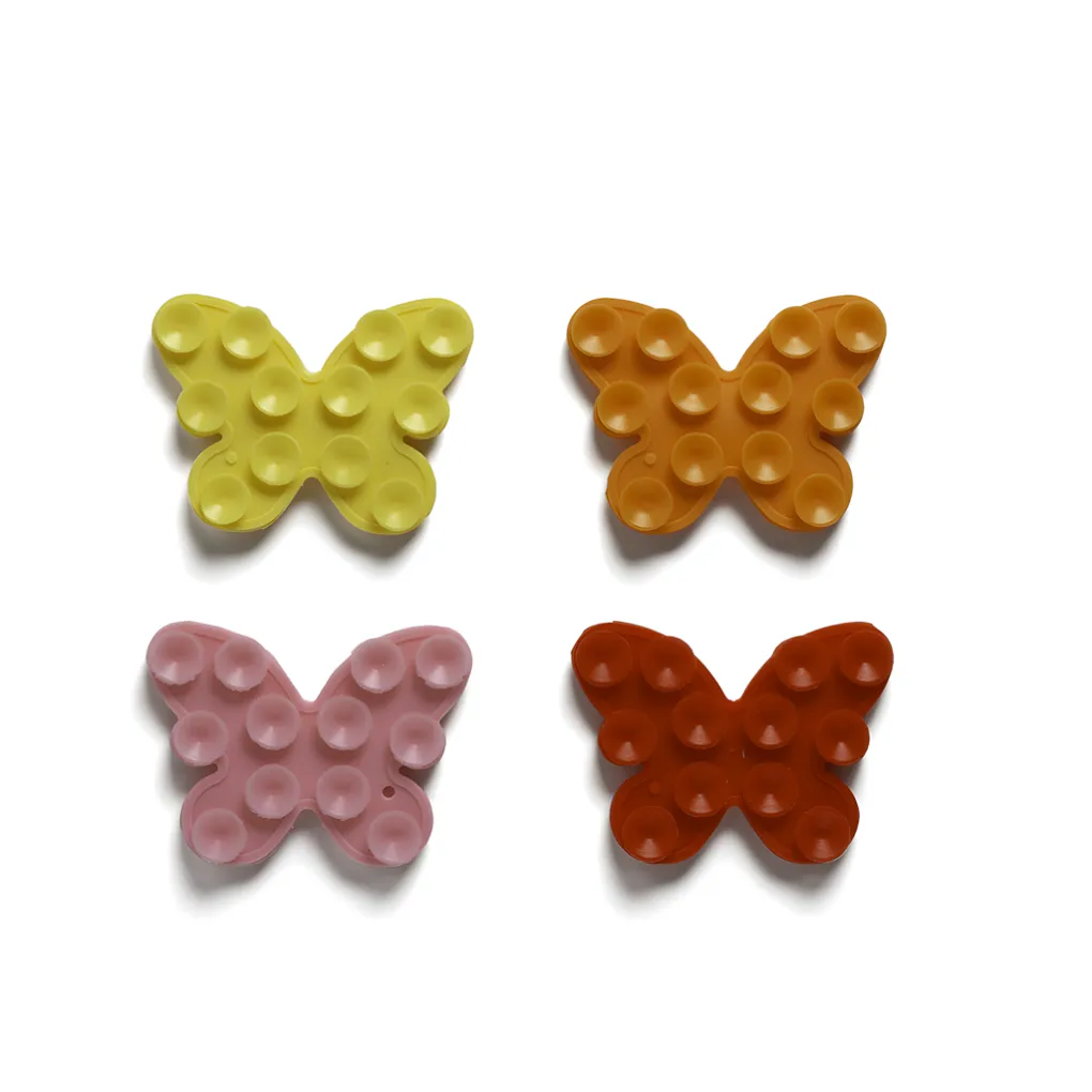 PEGATINA CELULAR DOBLE SOPAPA VENTOSA FORMA MARIPOSA